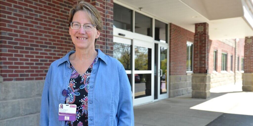Portrir of Dawna standing in front of medical facility